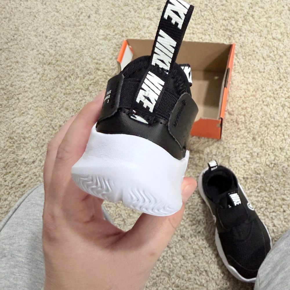 Nike Kids Black and White Slip-On Sneaker with Bold Swoosh - Picture 3 of 6